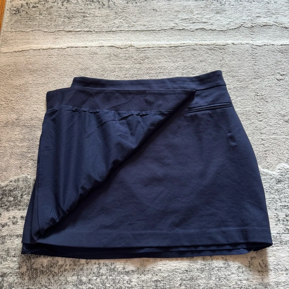 Ann Taylor Loft rich navy faux wrap asymmetrical skirt with faux pocket accent